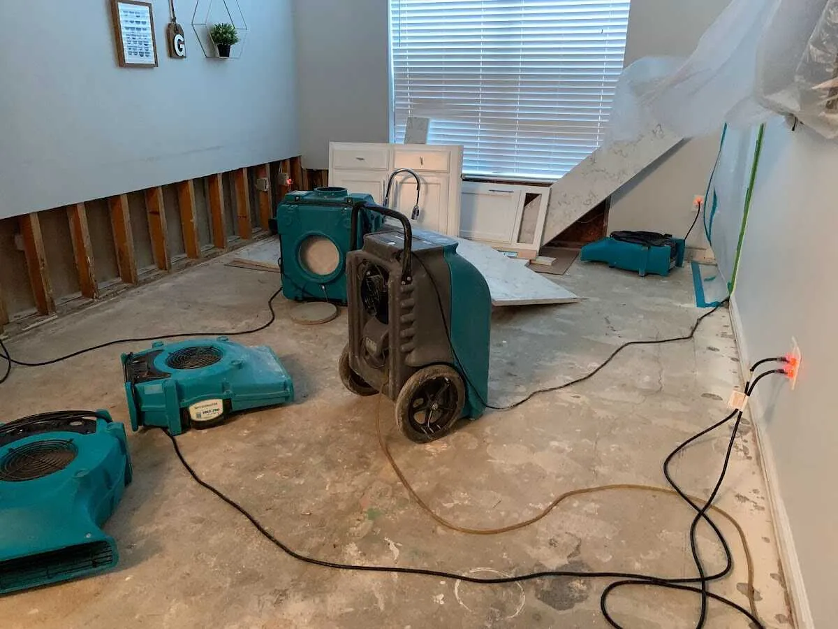 Dehumidifier in flood-cut room for Water Damage Restoration in Millcreek